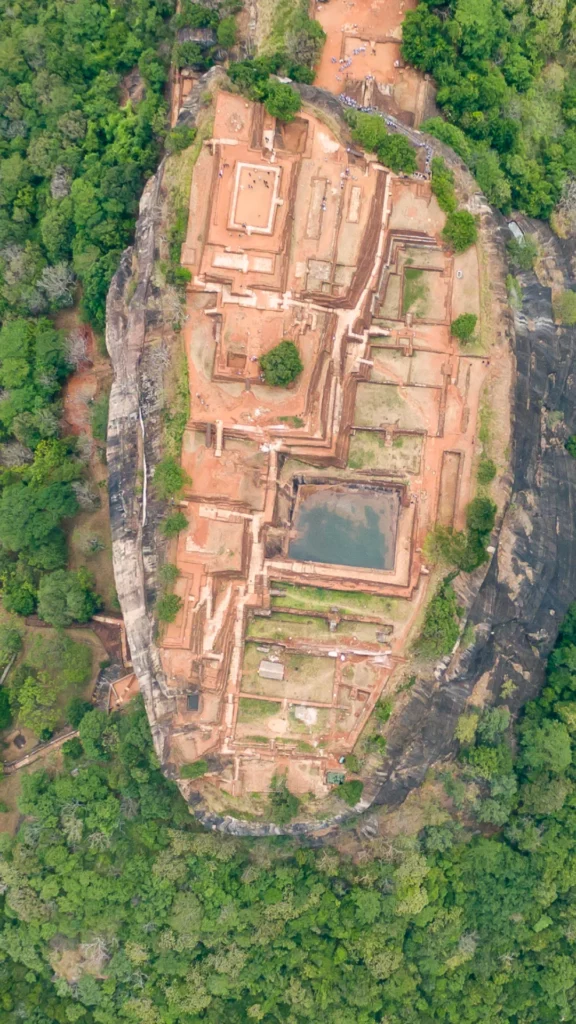 In which country was the city of Sigiriya, famous for its gigantic rock and ancient frescoes, rediscovered?